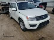 ✅ 2013 Suzuki Grand Vitara Premium • VIN: JS3TE0D62D4100310 • Lot: 54916065. Listed on Copart with 116,428 mi. Free auction sales archive from the USA and detailed vehicle history report at DreamBid. Image 14.