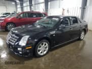 ✅ 2008 Cadillac STS AWD • VIN: 1G6DD67VX80168706 • Лот: 67594585. Опубликован ранее на Copart с пробегом 110 969 миль. Бесплатный доступ к архиву аукционных продаж из США и подробный отчёт об истории автомобиля на DreamBid. Изображение 1.