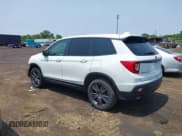 ✅ 2021 Honda Passport EX-L • VIN: 5FNYF8H59MB007097 • Lot: 42409181. Listed on IAAI with 74,410 mi. Free auction sales archive from the USA and detailed vehicle history report at DreamBid. Image 3.