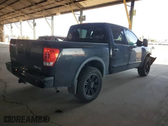✅ 2012 Nissan Titan Pro-4X • VIN: 1N6AA0ECXCN323965 • Лот: 92308695. Опубликован ранее на Copart с пробегом 130 702 миль. Бесплатный доступ к архиву аукционных продаж из США и подробный отчёт об истории автомобиля на DreamBid. Изображение 3.