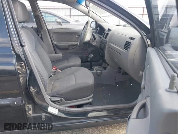 ✅ 2005 Kia Rio • VIN: KNADC125X56377797 • Lot: 41685739. Listed on IAAI with 103,390 mi. Free auction sales archive from the USA and detailed vehicle history report at DreamBid. Image 5.