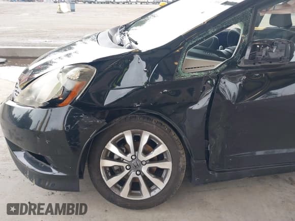 ✅ 2013 Honda Fit Sport • VIN: JHMGE8H59DC042068 • Lot: 41803884. Listed on IAAI with 128,223 mi. Free auction sales archive from the USA and detailed vehicle history report at DreamBid. Image 6.