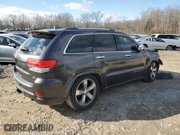 ✅ 2015 Jeep Grand Cherokee Overland • VIN: 1C4RJFCM4FC852509 • Lot: 84470024. Listed on Copart with 139,378 mi. Free auction sales archive from the USA and detailed vehicle history report at DreamBid. Image 3.