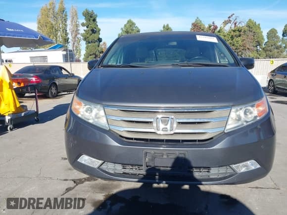 ✅ 2011 Honda Odyssey Touring • VIN: 5FNRL5H98BB063513 • Lot: 43599881. Listed on IAAI with 125,920 mi. Free auction sales archive from the USA and detailed vehicle history report at DreamBid. Image 12.