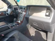 ✅ 2014 Lincoln Navigator • VIN: 5LMJJ3J56EEL04885 • Lot: 42051762. Listed on IAAI with 162,851 mi. Free auction sales archive from the USA and detailed vehicle history report at DreamBid. Image 5.