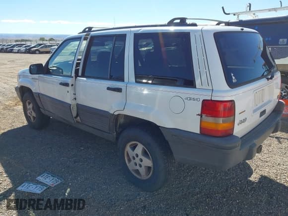 ✅ 1995 Jeep Grand Cherokee Laredo • VIN: 1J4GZ58Y6SC737646 • Lot: 43286723. Listed on IAAI with 212,936 mi. Free auction sales archive from the USA and detailed vehicle history report at DreamBid. Image 3.
