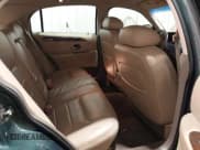 ✅ 1998 Lincoln Town Car Signature • VIN: 1LNFM82W8WY720232 • Lot: 42125723. Listed on IAAI with 132,494 mi. Free auction sales archive from the USA and detailed vehicle history report at DreamBid. Image 8.