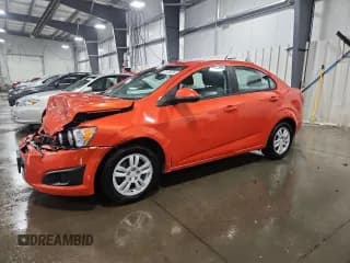✅ 2012 Chevrolet Sonic LS • VIN: 1G1JB5SH9C4136390 • Lot: 71676875. Listed on Copart with 80,646 mi. Free auction sales archive from the USA and detailed vehicle history report at DreamBid. Image 1.