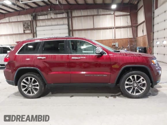 ✅ 2018 Jeep Grand Cherokee Limited • VIN: 1C4RJFBG0JC336703 • Lot: 43233310. Wystawiony na IAAI z przebiegiem 73 686 mil. Bezpłatny archiwum sprzedaży aukcyjnych z USA i szczegółowy raport historii pojazdu na DreamBid. Zdjęcie 13.
