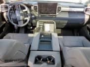 ✅ 2024 Toyota Tundra Limited Hybrid • VIN: 5TFJC5DB7RX049446 • Лот: 69809905. Опубликован ранее на Copart с пробегом 26 064 миль. Бесплатный доступ к архиву аукционных продаж из США и подробный отчёт об истории автомобиля на DreamBid. Изображение 8.