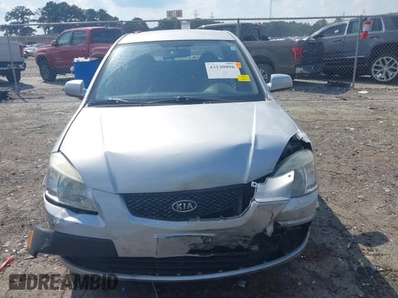 ✅ 2009 Kia Rio LX • VIN: KNADE223296459124 • Lot: 43130896. Wystawiony na IAAI z przebiegiem 129 998 mil. Bezpłatny archiwum sprzedaży aukcyjnych z USA i szczegółowy raport historii pojazdu na DreamBid. Zdjęcie 12.