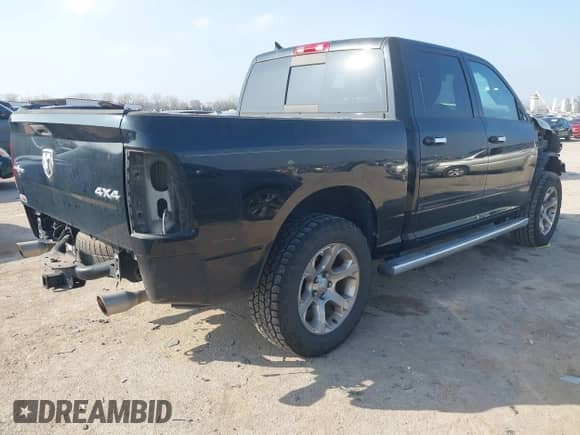 2014 Ram 1500 Big Horn with VIN 1C6RR7LT7ES467737, listed as a IAAI auction lot 41500537 with 131,328 mi miles and . Bid and sale history available at DreamBid. Image 4.