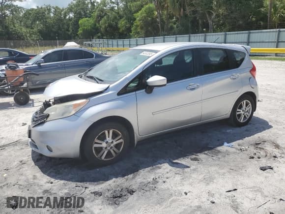 ✅ 2015 Nissan Note SR • VIN: 3N1CE2CP1FL358760 • Lot: 64343595. Listed on Copart with 129,730 mi. Free auction sales archive from the USA and detailed vehicle history report at DreamBid. Image 1.