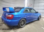 ✅ 2005 Subaru Impreza WRX STI • VIN: JF1GD70695L504915 • Lot: 59961185. Listed on Copart with 167,941 mi. Free auction sales archive from the USA and detailed vehicle history report at DreamBid. Image 3.