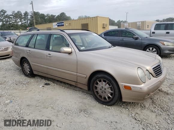 ✅ 2001 Mercedes-Benz E 320 • VIN: WDBJH65J41B312277 • Лот: 70261594. Опубликован ранее на Copart с пробегом 123 702 миль. Бесплатный доступ к архиву аукционных продаж из США и подробный отчёт об истории автомобиля на DreamBid. Изображение 4.