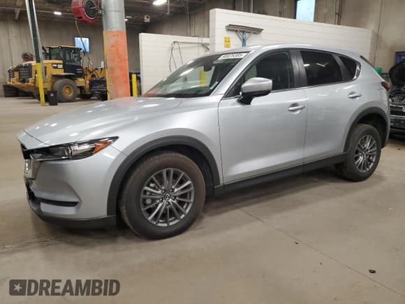 ✅ 2021 Mazda CX-5 Touring • VIN: JM3KFBCMXM0453623 • Lot: 90025385. Wystawiony na Copart z przebiegiem 83 246 mil. Bezpłatny archiwum sprzedaży aukcyjnych z USA i szczegółowy raport historii pojazdu na DreamBid. Zdjęcie 1.