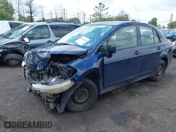 ✅ 2009 Nissan Versa 1.6 • VIN: 3N1CC11E79L481887 • Lot: 42610028. Listed on IAAI with 98,264 mi. Free auction sales archive from the USA and detailed vehicle history report at DreamBid. Image 2.