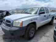 ✅ 2006 Dodge Dakota ST • VIN: 1D7HE28N96S528476 • Лот: 63207085. Размещён на Copart с пробегом 204 478 миль миль. Получите бесплатный доступ к архиву аукционных продаж из США и посмотрите подробный отчёт об истории автомобиля на DreamBid. Изображение 1.