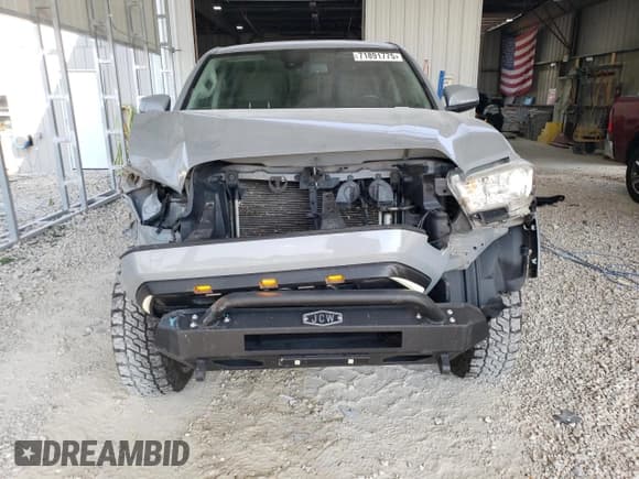 ✅ 2021 Toyota Tacoma SR • VIN: 3TMCZ5AN7MM436325 • Lot: 71891775. Listed on Copart with 103,546 mi. Free auction sales archive from the USA and detailed vehicle history report at DreamBid. Image 5.