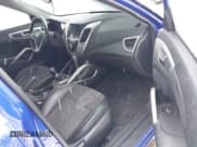 ✅ 2014 Hyundai Veloster • VIN: KMHTC6AD0EU186563 • Lot: 41572856. Wystawiony na IAAI z przebiegiem 156 227 mil. Bezpłatny archiwum sprzedaży aukcyjnych z USA i szczegółowy raport historii pojazdu na DreamBid. Zdjęcie 5.