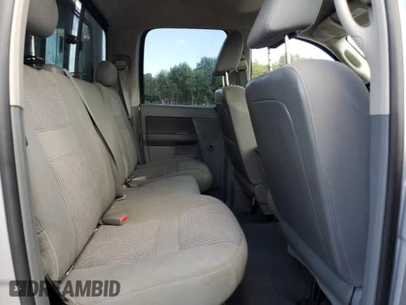 2006 Dodge 1500 Laramie z VIN 1D7HU182X6S590830, wystawiony jako Copart lot #70185885 z przebiegiem 219 672 mil mil oraz Szkoda całkowita • Salvage title. Historia ofert i sprzedaży dostępna na DreamBid. Obrazek 10.