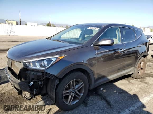 2018 Hyundai Santa Fe 2.4L with VIN 5XYZT3LB2JG509984, listed as a Copart auction lot 85510595 with 103,988 mi miles and Salvage title. Bid and sale history available at DreamBid. Image 1.