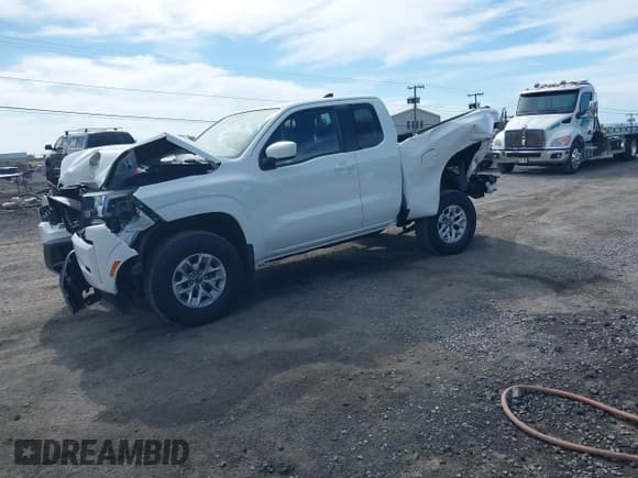 ✅ 2024 Nissan Frontier S • VIN: 1N6ED1CM1RN660317 • Lot: 41086992. Listed on IAAI with 4,933 mi. Free auction sales archive from the USA and detailed vehicle history report at DreamBid. Image 2.