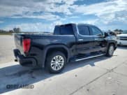 ✅ 2021 GMC Sierra 1500 Denali • VIN: 3GTP8FED4MG112436 • Lot: 81954835. Wystawiony na Copart z przebiegiem 93 009 mil. Bezpłatny archiwum sprzedaży aukcyjnych z USA i szczegółowy raport historii pojazdu na DreamBid. Zdjęcie 3.