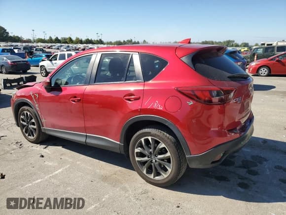 ✅ 2016 Mazda CX-5 Grand Touring • VIN: JM3KE4DY2G0676811 • Lot: 85204805. Wystawiony na Copart z przebiegiem 116 610 mil. Bezpłatny archiwum sprzedaży aukcyjnych z USA i szczegółowy raport historii pojazdu na DreamBid. Zdjęcie 2.
