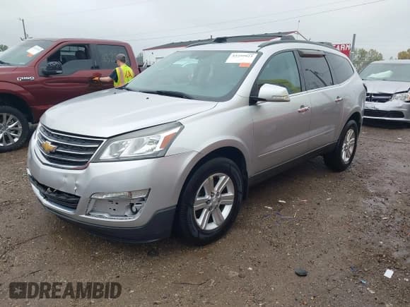 ✅ 2014 Chevrolet Traverse LT • VIN: 1GNKRHKD0EJ292318 • Lot: 43299923. Listed on IAAI with 135,449 mi. Free auction sales archive from the USA and detailed vehicle history report at DreamBid. Image 17.