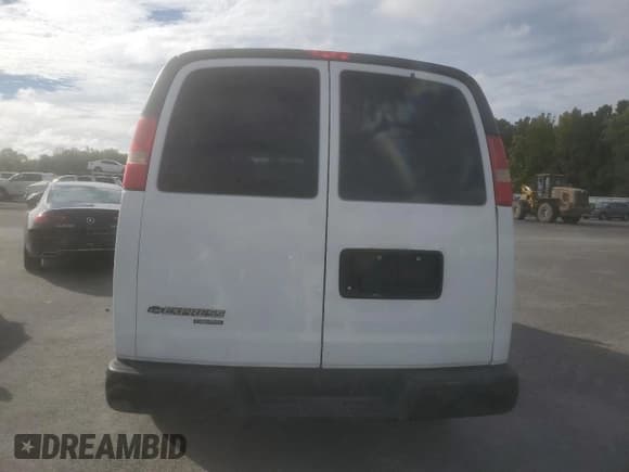 ✅ 2014 Chevrolet Express Passenger 1LS • VIN: 1GAZGZFAXE1105162 • Lot: 72773154. Listed on Copart with 97,950 mi. Free auction sales archive from the USA and detailed vehicle history report at DreamBid. Image 6.