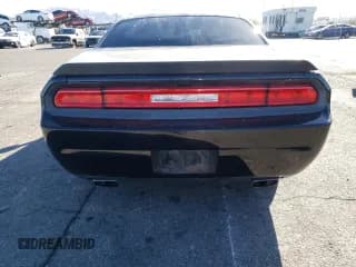 ✅ 2012 Dodge Challenger SXT • VIN: 2C3CDYAG6CH185543 • Lot: 80472334. Wystawiony na Copart z przebiegiem 151 035 mil. Bezpłatny archiwum sprzedaży aukcyjnych z USA i szczegółowy raport historii pojazdu na DreamBid. Zdjęcie 6.