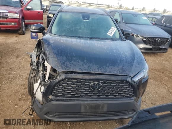 ✅ 2022 Toyota Corolla Cross LE • VIN: 7MUBAABG6NV005221 • Lot: 86443625. Listed on Copart with 74,970 mi. Free auction sales archive from the USA and detailed vehicle history report at DreamBid. Image 5.