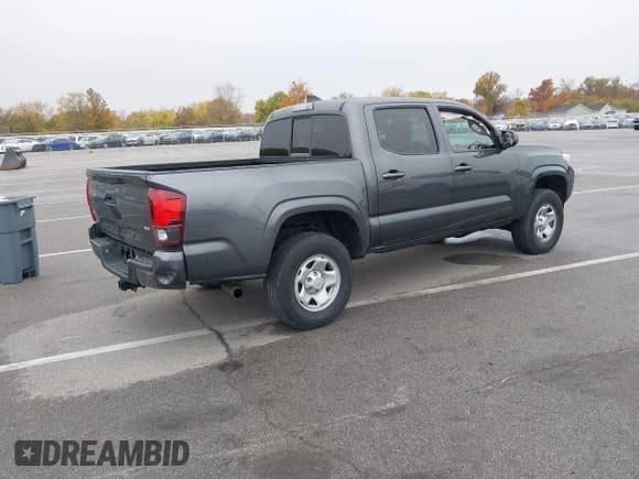 ✅ 2023 Toyota Tacoma TRD Off Road • VIN: 3TMCZ5AN5PM571369 • Lot: 43559181. Listed on IAAI with 56,795 mi. Free auction sales archive from the USA and detailed vehicle history report at DreamBid. Image 4.