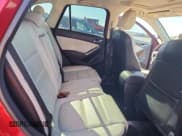 ✅ 2016 Mazda CX-5 Grand Touring • VIN: JM3KE2DYXG0911170 • Lot: 87034675. Wystawiony na Copart z przebiegiem 143 790 mil. Bezpłatny archiwum sprzedaży aukcyjnych z USA i szczegółowy raport historii pojazdu na DreamBid. Zdjęcie 11.