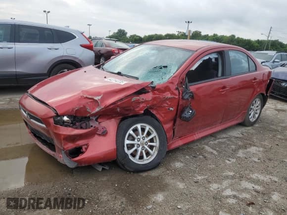 ✅ 2014 Mitsubishi Lancer ES • VIN: JA32U2FU5EU013652 • Lot: 64314235. Listed on Copart with 65,613 mi. Free auction sales archive from the USA and detailed vehicle history report at DreamBid. Image 1.
