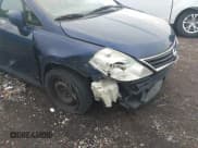 ✅ 2010 Nissan Versa S • VIN: 3N1BC1AP5AL403111 • Lot: 42594484. Listed on IAAI with 152,453 mi. Free auction sales archive from the USA and detailed vehicle history report at DreamBid. Image 18.