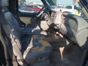 ✅ 1999 GMC Suburban • VIN: 3GKEC16R7XG527908 • Лот: 41657788. Опубликован ранее на IAAI с пробегом 216 894 миль. Бесплатный доступ к архиву аукционных продаж из США и подробный отчёт об истории автомобиля на DreamBid. Изображение 5.