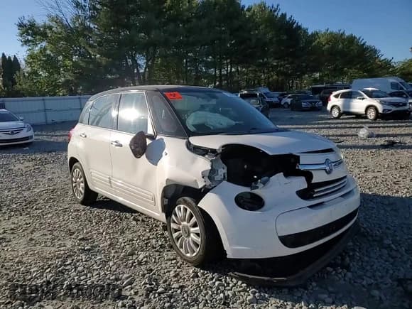 ✅ 2014 FIAT 500L Easy • VIN: ZFBCFABH4EZ023856 • Lot: 76285024. Listed on Copart with 131,343 mi. Free auction sales archive from the USA and detailed vehicle history report at DreamBid. Image 12.