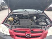 ✅ 2005 Mazda Tribute S • VIN: 4F2CZ96125KM51790 • Lot: 43764842. Listed on IAAI with 181,126 mi. Free auction sales archive from the USA and detailed vehicle history report at DreamBid. Image 10.