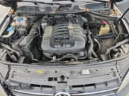 ✅ 2013 Volkswagen Touareg Lux • VIN: WVGEF9BP6DD010352 • Lot: 62585305. Listed on Copart with 210,935 mi. Free auction sales archive from the USA and detailed vehicle history report at DreamBid. Image 12.