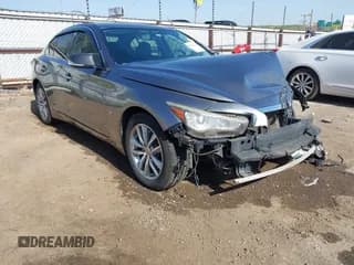 ✅ 2015 Infiniti Q50 • VIN: JN1BV7AP6FM335914 • Lot: 42065648. Listed on IAAI with 192,986 mi. Free auction sales archive from the USA and detailed vehicle history report at DreamBid. Image 1.