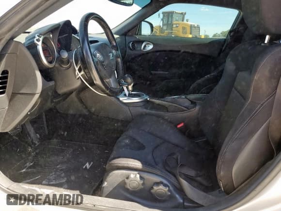 ✅ 2018 Nissan 370Z • VIN: JN1AZ4EH4JM571648 • Лот: 66015985. Опубликован ранее на Copart с пробегом 69 739 миль. Бесплатный доступ к архиву аукционных продаж из США и подробный отчёт об истории автомобиля на DreamBid. Изображение 7.