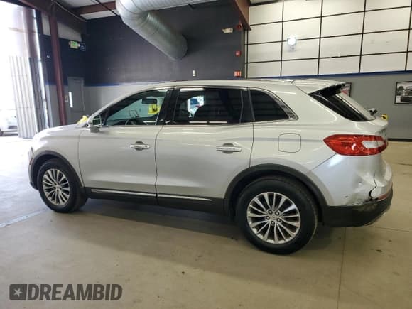 ✅ 2016 Lincoln MKX Select • VIN: 2LMTJ8KR3GBL75619 • Lot: 93220355. Listed on Copart with 97,456 mi. Free auction sales archive from the USA and detailed vehicle history report at DreamBid. Image 2.
