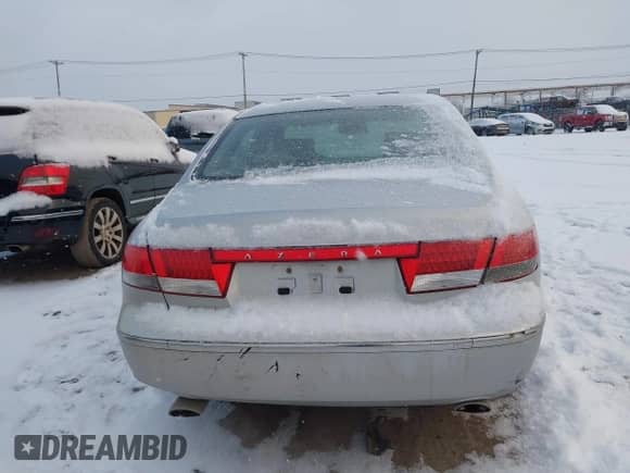 2006 Hyundai Azera SE z VIN KMHFC46F46A093575, wystawiony jako IAAI lot #41259753 z przebiegiem 164 453 mil mil oraz . Historia ofert i sprzedaży dostępna na DreamBid. Obrazek 16.