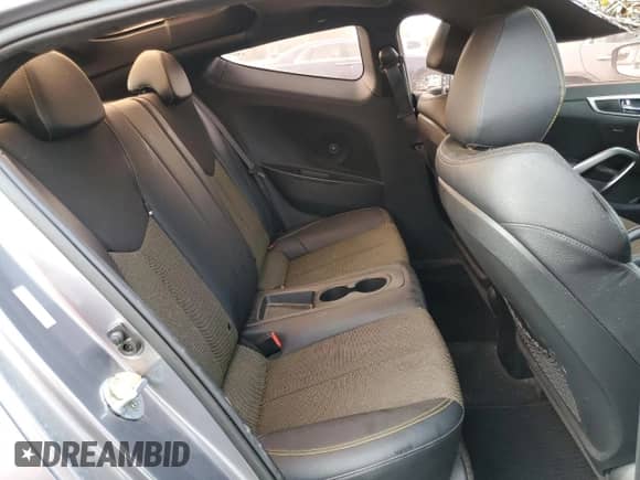 2016 Hyundai Veloster z VIN KMHTC6AD9GU260582, wystawiony jako Copart lot #71878294 z przebiegiem 83 155 mil mil oraz Szkoda całkowita • Salvage title. Historia ofert i sprzedaży dostępna na DreamBid. Obrazek 10.