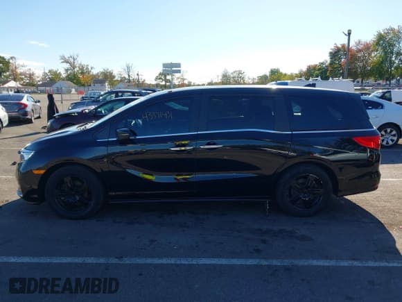 ✅ 2023 Honda Odyssey Touring • VIN: 5FNRL6H83PB060524 • Lot: 43371431. Listed on IAAI with 9,840 mi. Free auction sales archive from the USA and detailed vehicle history report at DreamBid. Image 6.