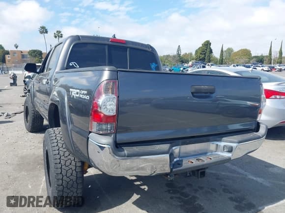 ✅ 2012 Toyota Tacoma • VIN: 5TFLU4EN5CX037912 • Lot: 41691626. Listed on IAAI with 164,265 mi. Free auction sales archive from the USA and detailed vehicle history report at DreamBid. Image 3.