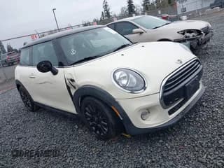 ✅ 2018 MINI Hardtop Cooper • VIN: WMWXP5C56J2D71961 • Lot: 41933887. Listed on IAAI with 53,434 mi. Free auction sales archive from the USA and detailed vehicle history report at DreamBid. Image 1.