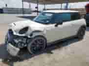 2015 MINI Hardtop S with VIN WMWXP7C56F2A58203, listed as a Copart auction lot 62602855 with 101,679 mi miles and Salvage title. Bid and sale history available at DreamBid. Image 1.